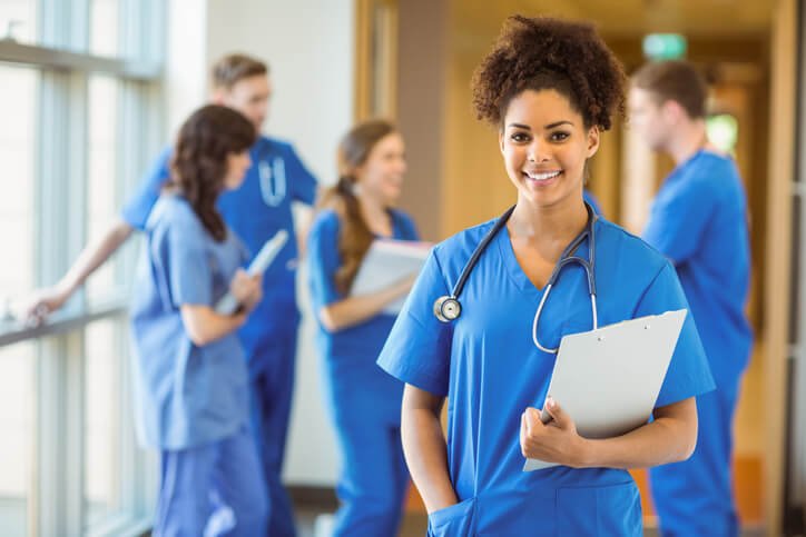 Medical student smiling at the camera at the university